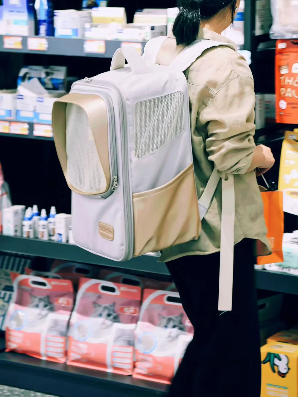 Smart Pack Pro premium cat carrier backpack in beige and grey featuring breathable side mesh panels