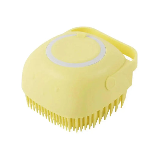 Dog and Cat Grooming Brush with built-in shampoo dispenser for shower bathing. Features soft bristles for gentle pet massage and deep cleansing.