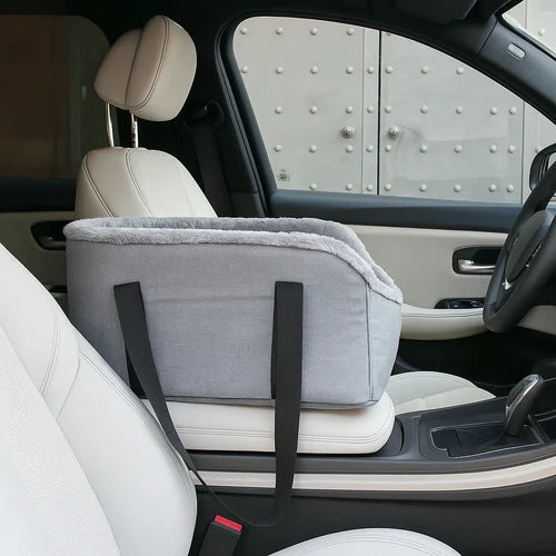 Center Console Pet Bag for Safe Comfortable Travel Gray pet seat cover with straps on a car seat
