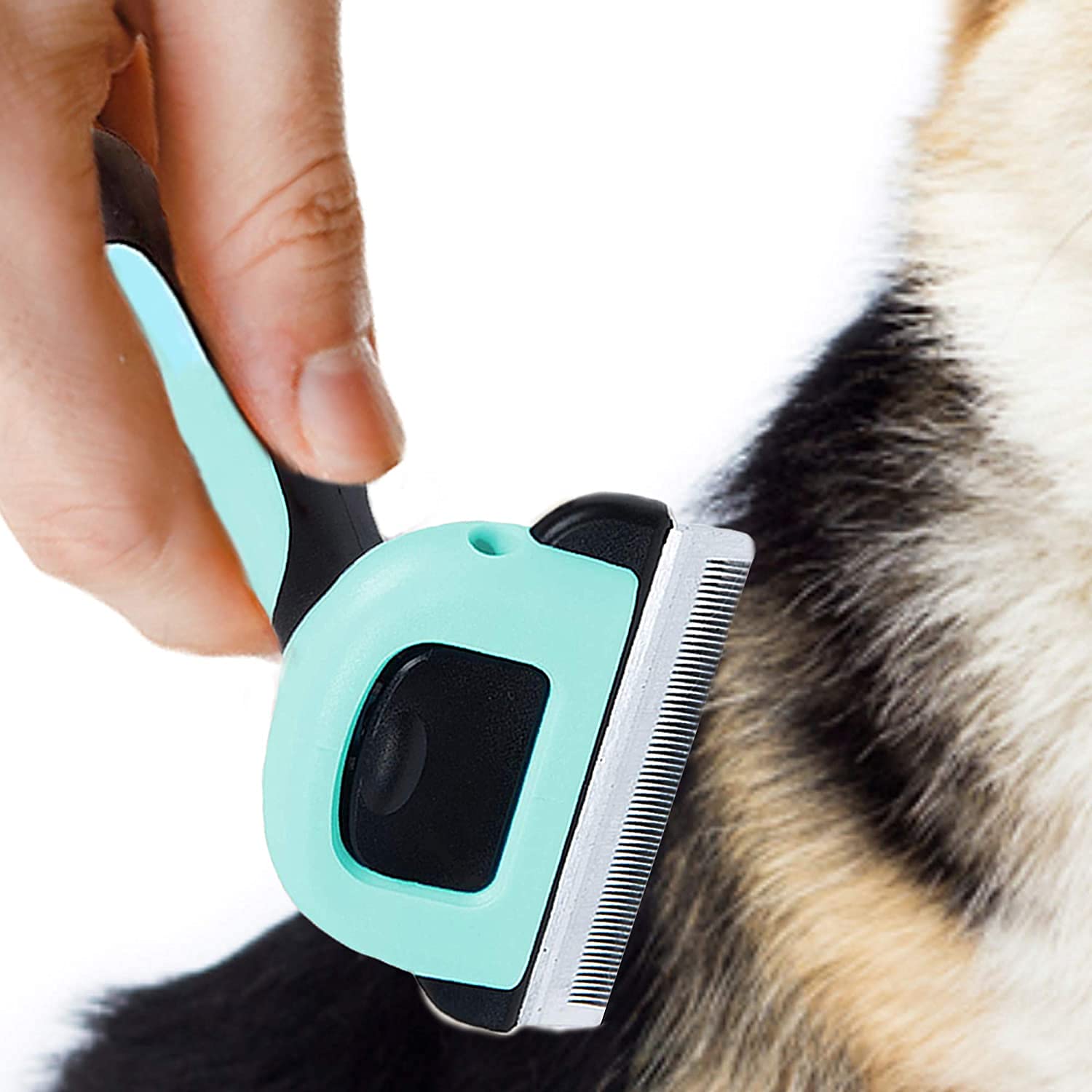 Ergonomic grip pet grooming tool with quick release button