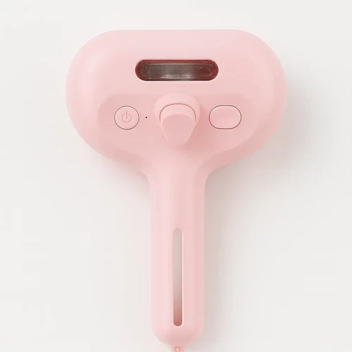 HydroBrush Spray Pet Comb for Easy Grooming Pink handheld hair dryer on a white background